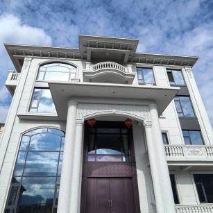 镇江白麻别墅外墙干挂石材效果示例